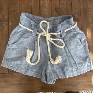 Relaxed light blue shorts with white rope belt, size 2